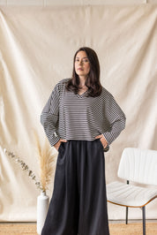 Black oversized rib knit sweater with V-neck – MAS Montréal, SS27