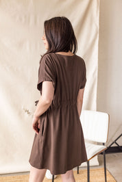 Brown jersey dress with cross-over front and drop shoulder – MAS Montréal, SS27