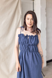 Blue linen-cotton dress with tiered gathering and front ties – MAS Montréal, SS27
