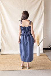 Blue linen-cotton dress with tiered gathering and front ties – MAS Montréal, SS27
