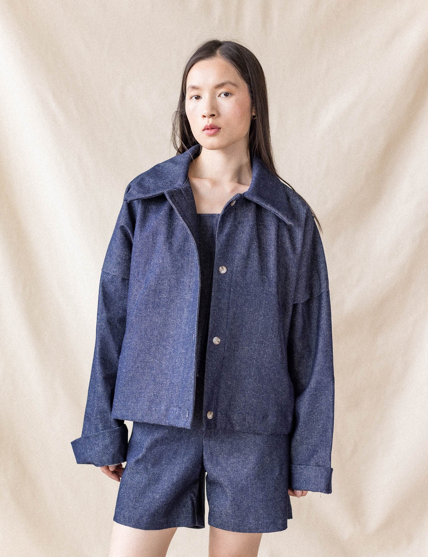 Indigo oversized denim coat with front pockets and button closure – MAS Montréal, SS27