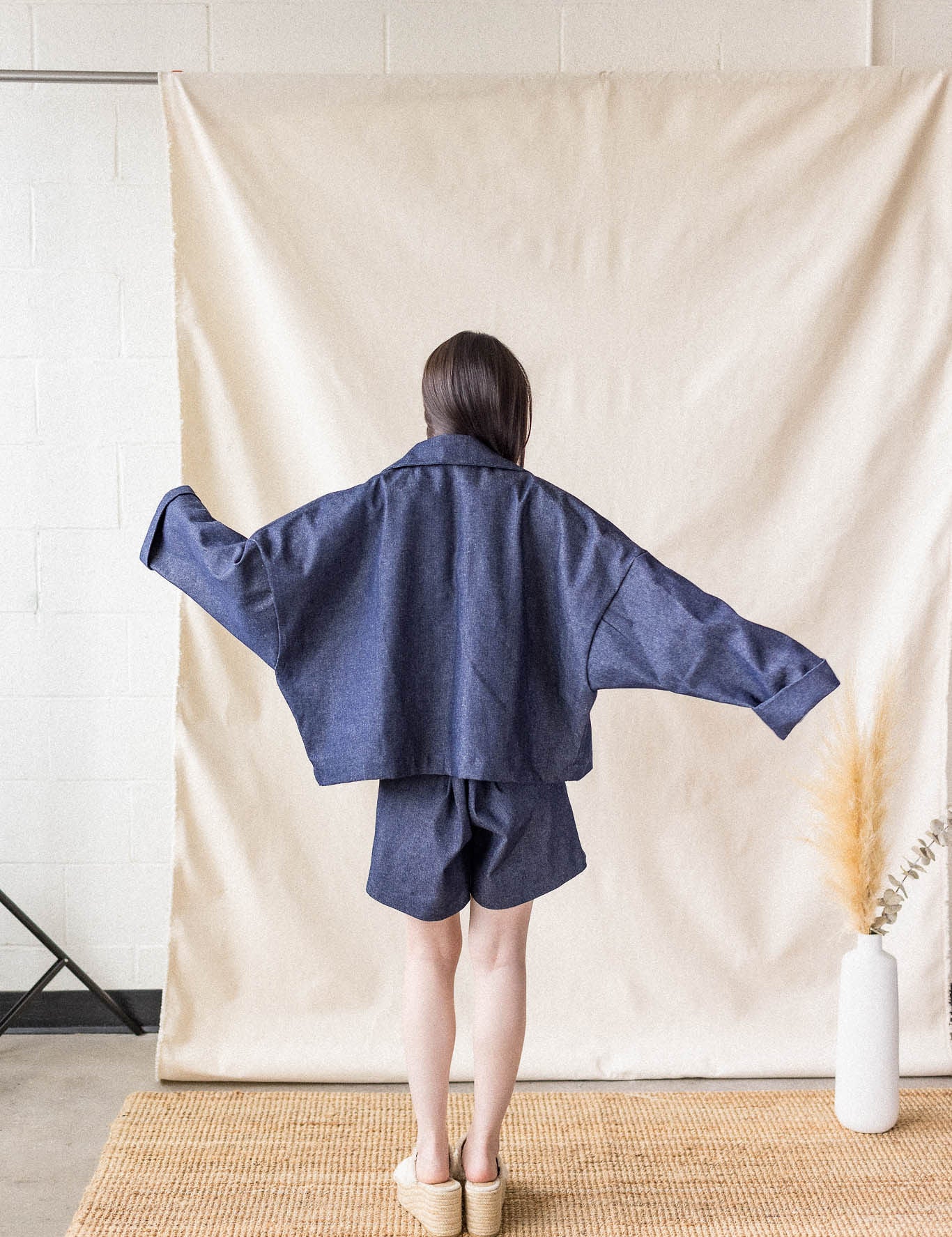 Indigo oversized denim coat with front pockets and button closure – MAS Montréal, SS27