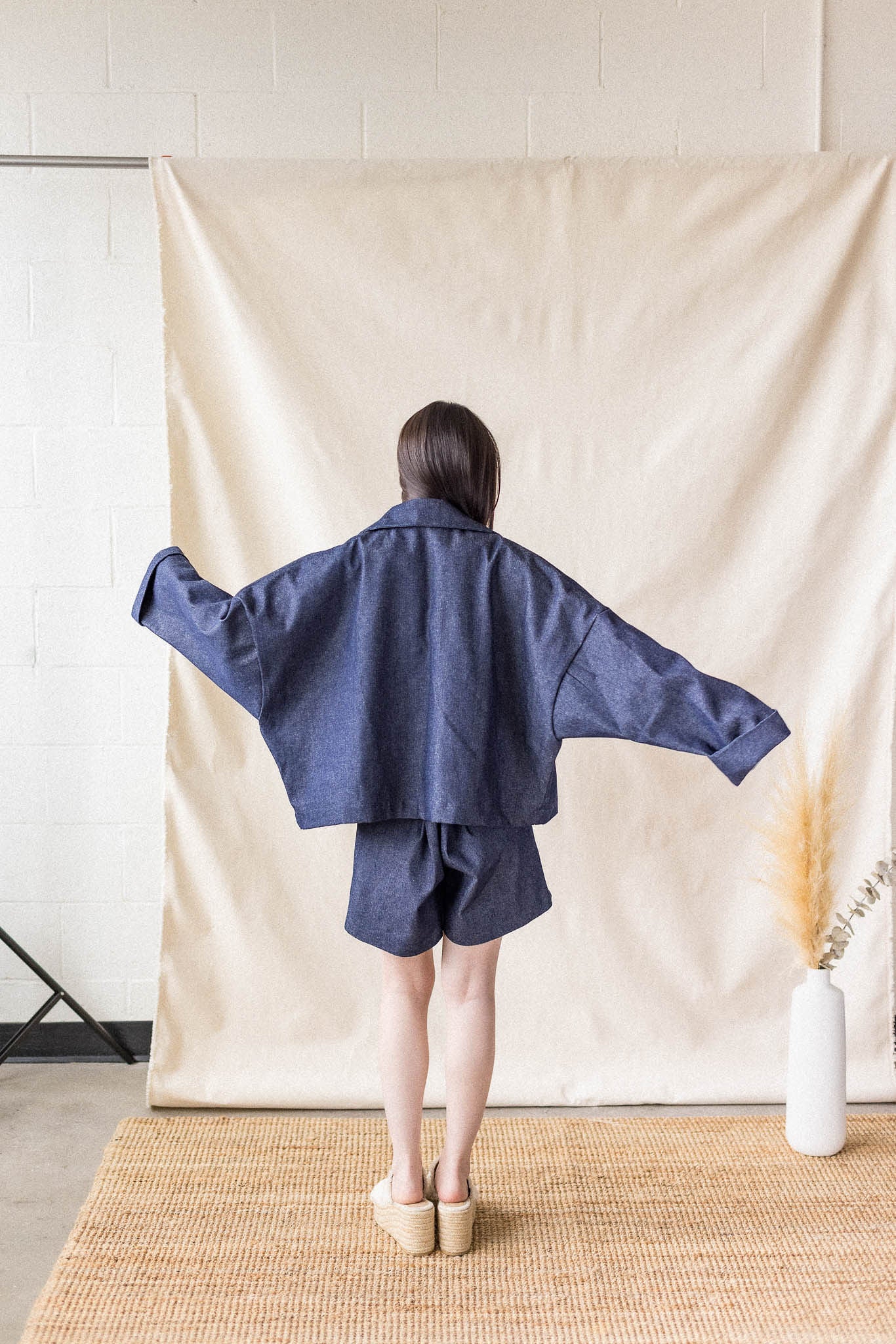 Indigo oversized denim coat with front pockets and button closure – MAS Montréal, SS27