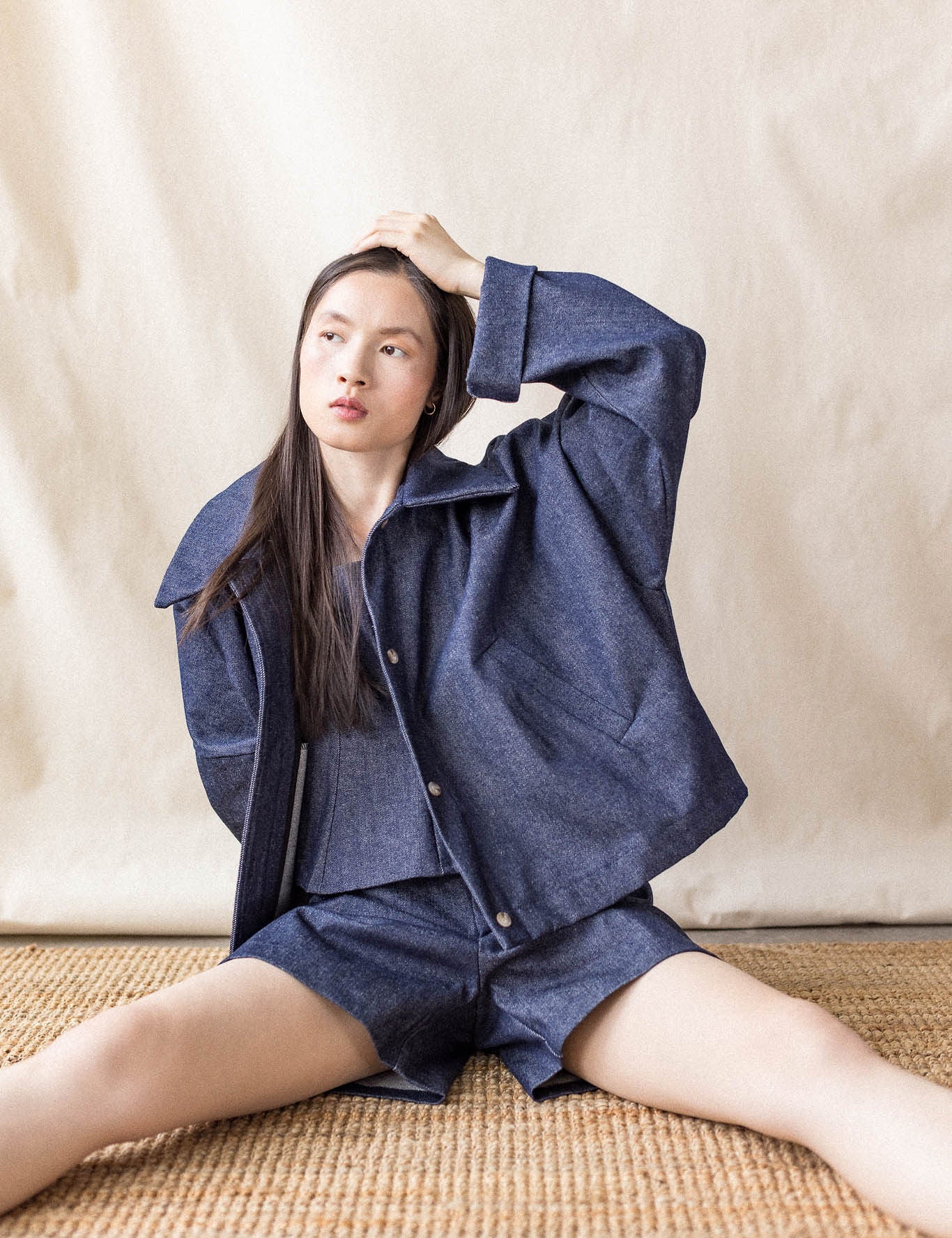 Indigo oversized denim coat with front pockets and button closure – MAS Montréal, SS27