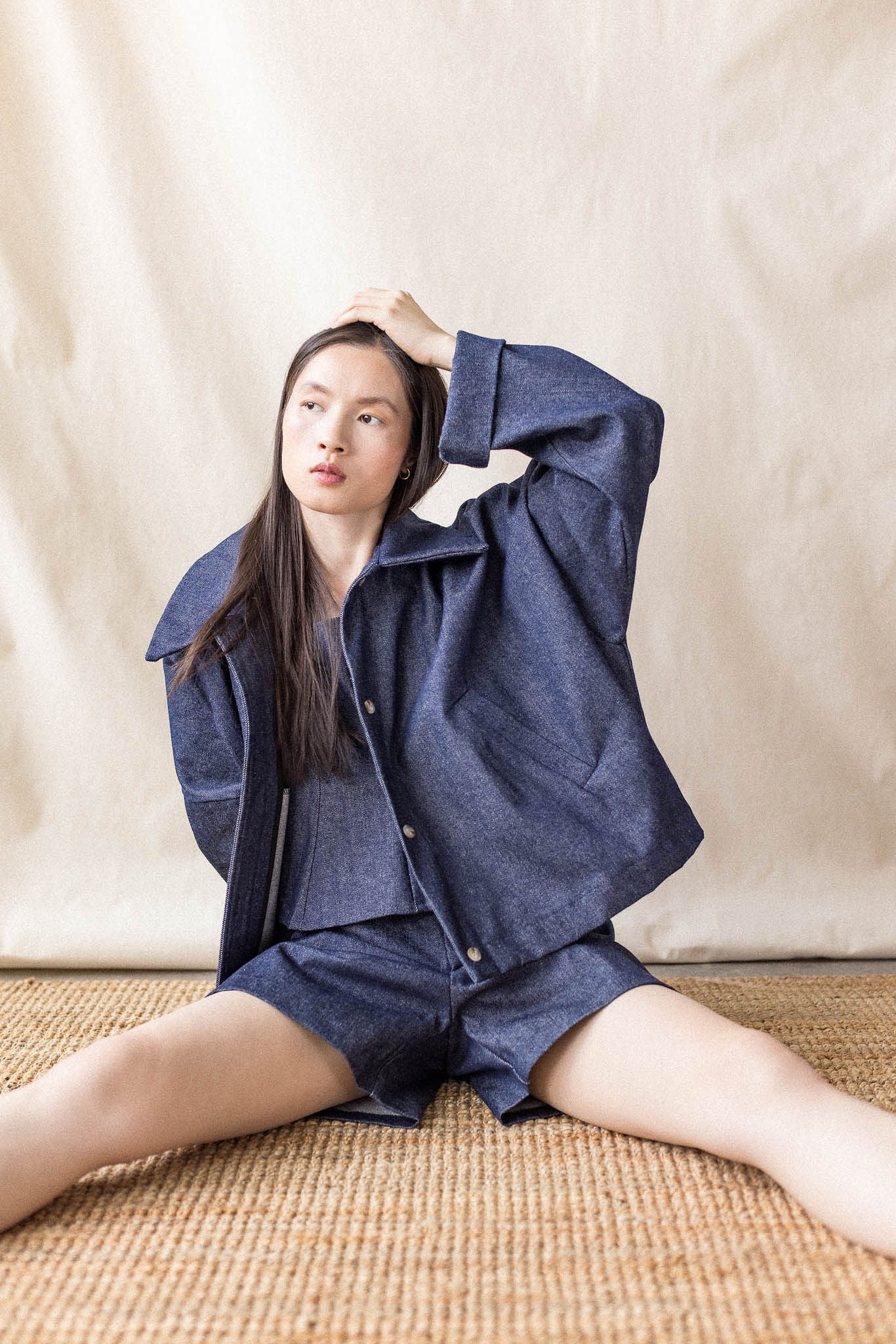 Indigo oversized denim coat with front pockets and button closure – MAS Montréal, SS27
