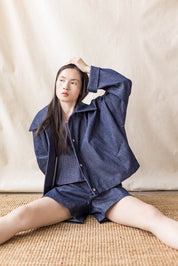 Indigo oversized denim coat with front pockets and button closure – MAS Montréal, SS27