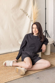 Black cotton poplin blouse with hidden oversized pockets – MAS Montréal, SS27