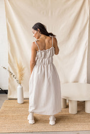 Beige linen-cotton dress with tiered gathering and front ties – MAS Montréal, SS27