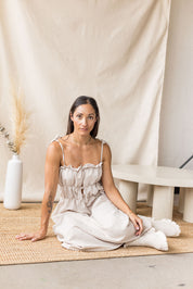 Beige linen-cotton dress with tiered gathering and front ties – MAS Montréal, SS27