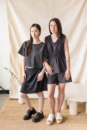 Black denim top with back binding detail – MAS Montréal, SS27
