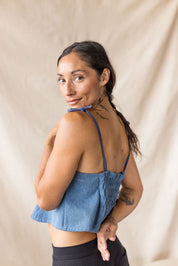 Blue denim peplum top with tie straps – MAS Montréal, SS27