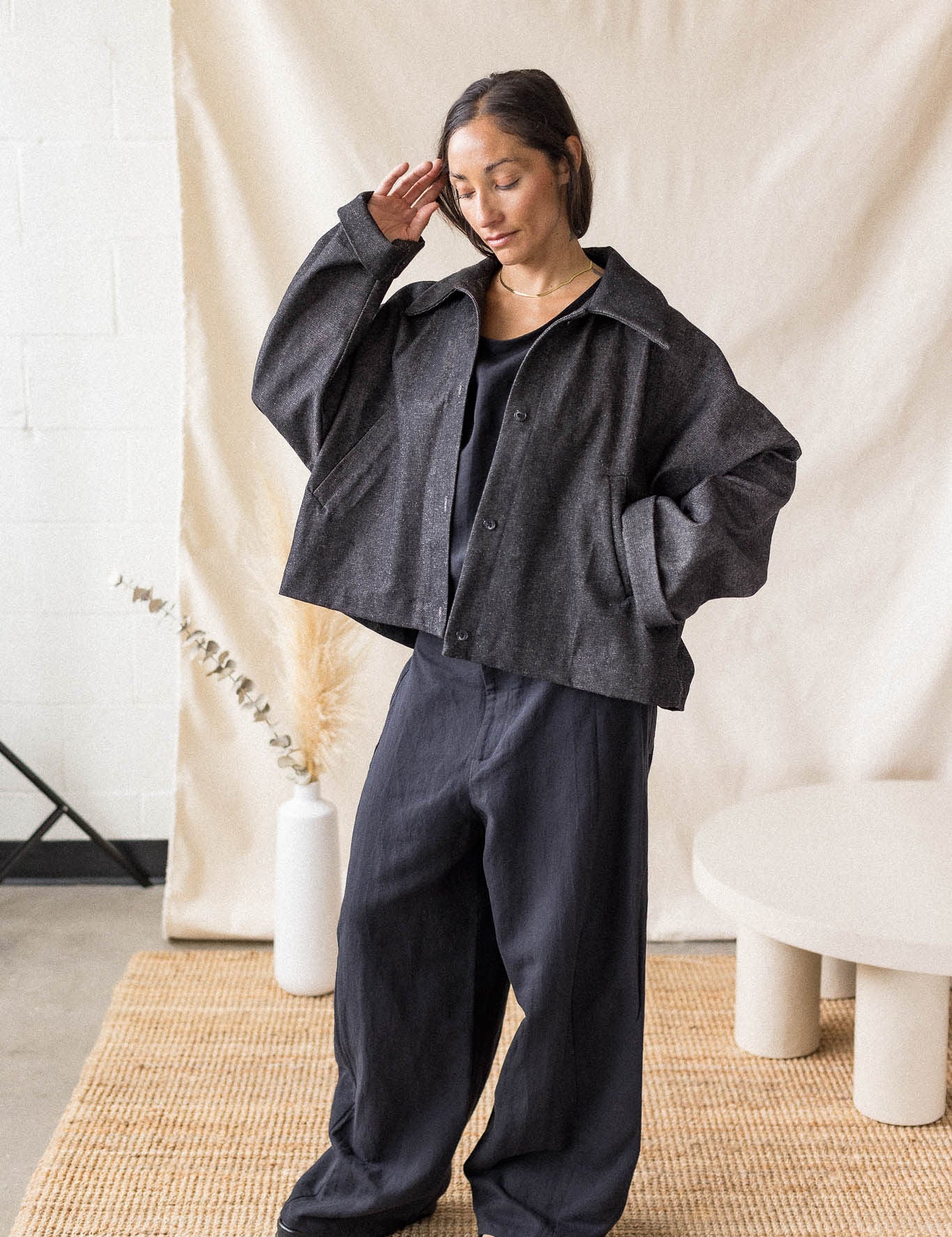 Black oversized denim coat with front pockets and button closure – MAS Montréal, SS27