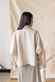 Beige oversized denim coat with front pockets and button closure – MAS Montréal, SS27