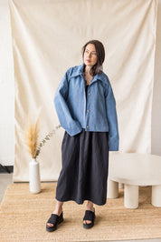 Blue oversized denim coat with front pockets and button closure – MAS Montréal, SS27