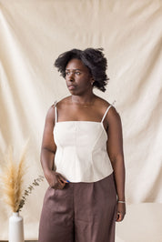 Beige denim peplum top with tie straps – MAS Montréal, SS27