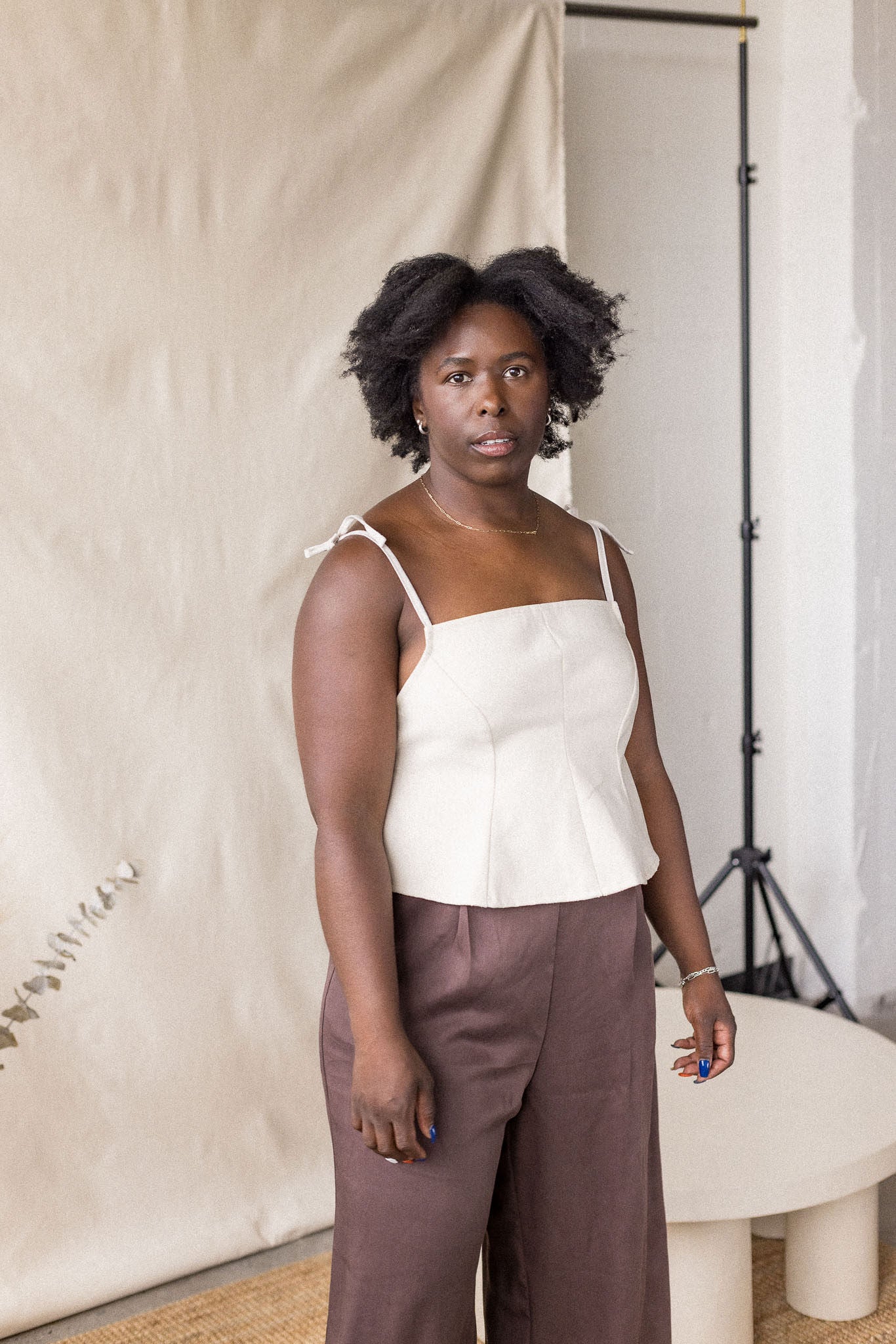 Beige denim peplum top with tie straps – MAS Montréal, SS27