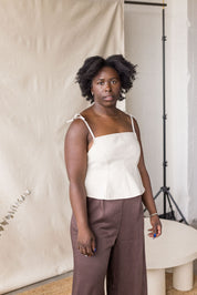 Beige denim peplum top with tie straps – MAS Montréal, SS27