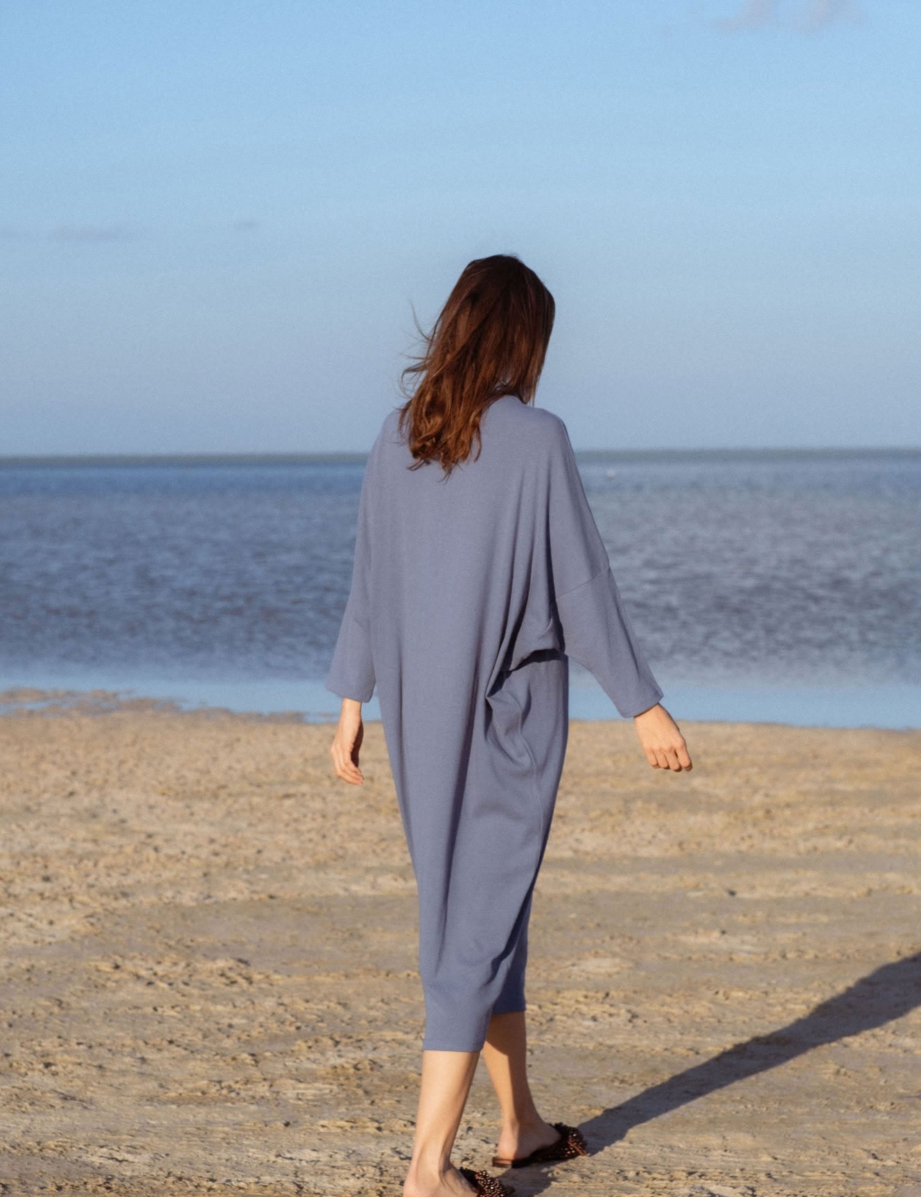 Iona Dress in Teal Blue (Caspian) ribbed turtleneck maxi dress, side view - MAS Montréal