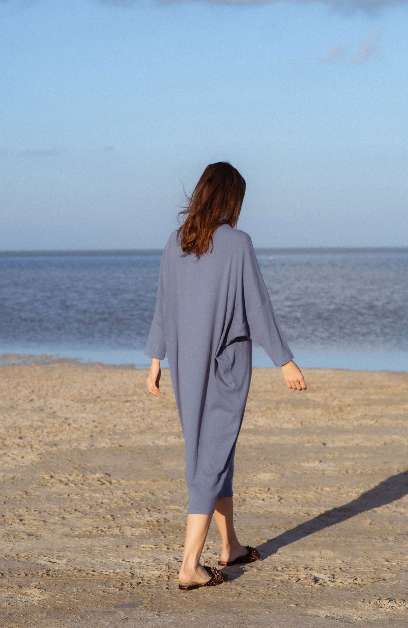 Iona Dress in Teal Blue (Caspian) ribbed turtleneck maxi dress, side view - MAS Montréal