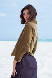 Byron Sweater in Moss Green (Moss) oversized velvet rib turtleneck, detail - MAS Montréal
