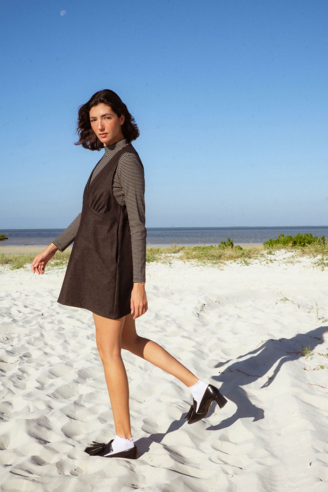 Valletta Dress in Black Denim (Carbon Denim) deep V-neck denim mini dress, side view - MAS Montréal