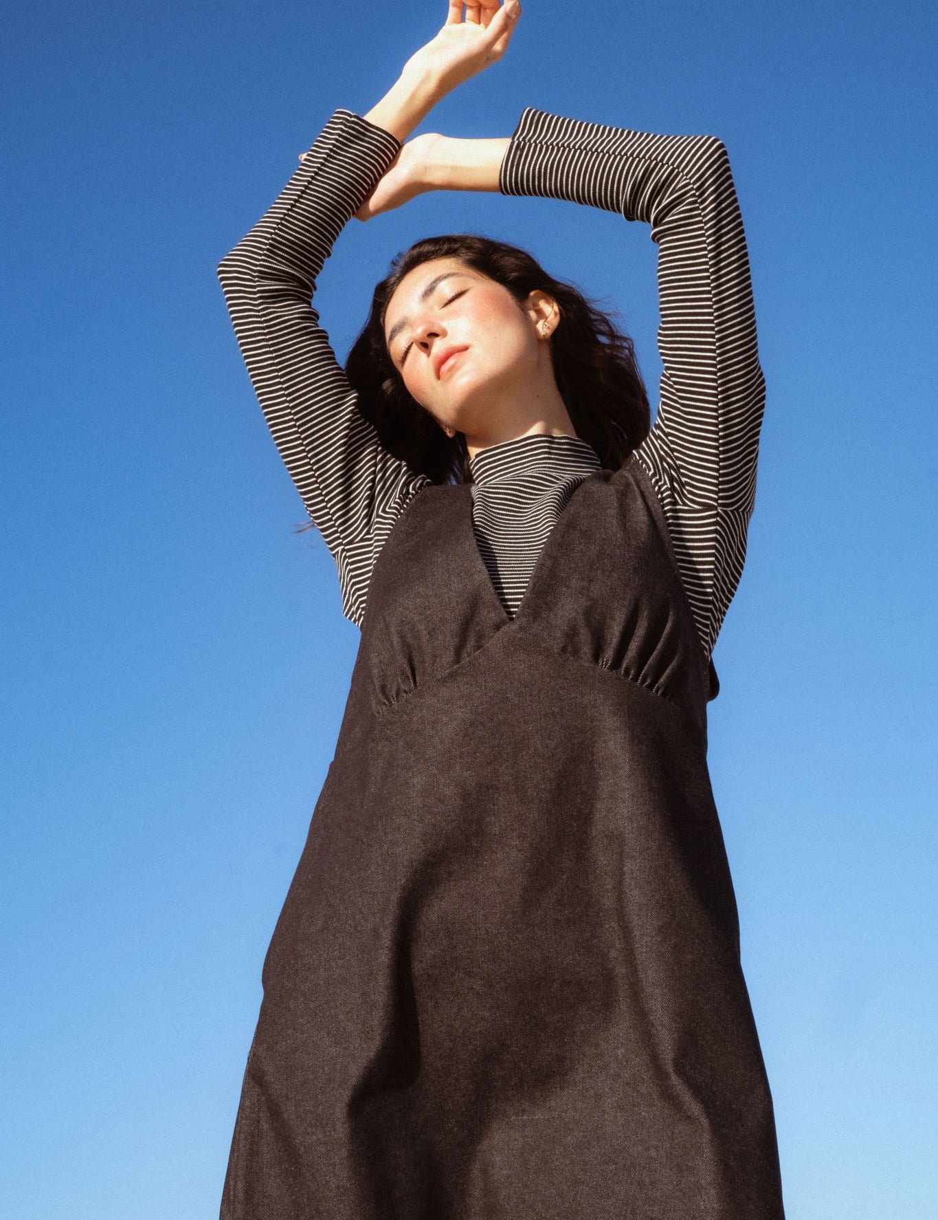 Valletta Dress in Black Denim (Carbon Denim) deep V-neck denim mini dress, back view - MAS Montréal