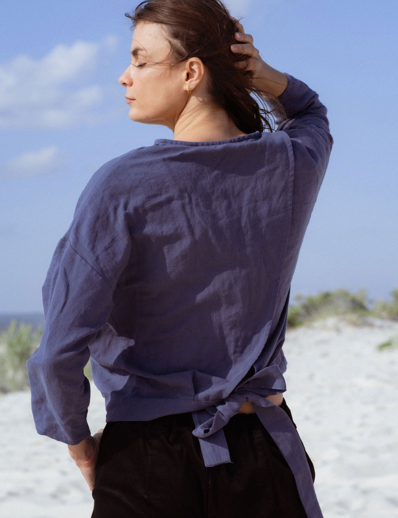 Arden Blouse in Teal Blue (Caspian) linen-cotton wrap blouse, side view - MAS Montréal
