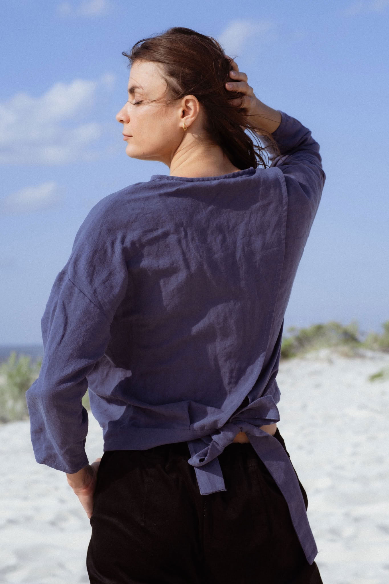 Arden Blouse in Teal Blue (Caspian) linen-cotton wrap blouse, side view - MAS Montréal