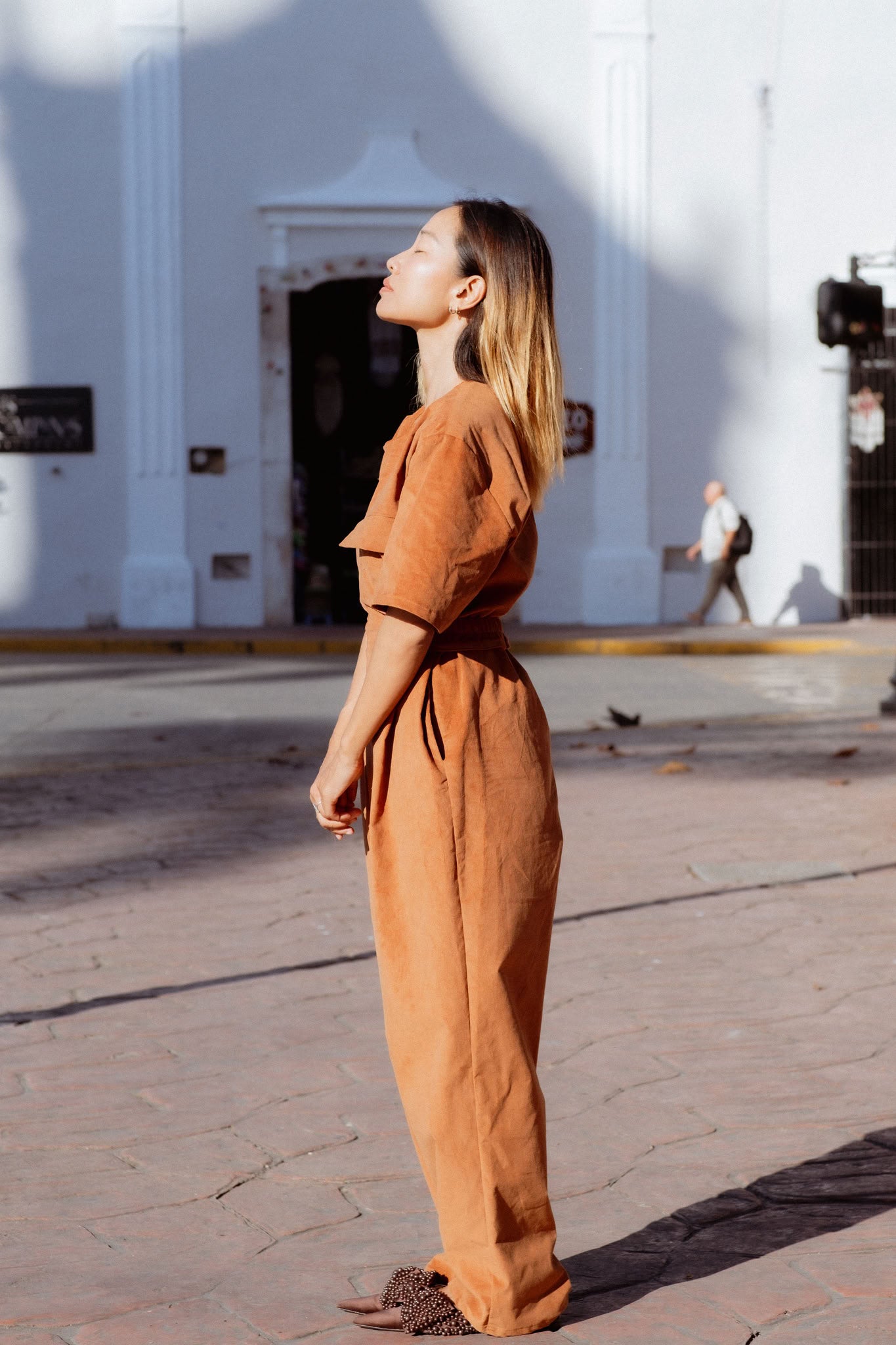 Bagan Jumpsuit in Rust (Copper) wide leg corduroy jumpsuit, worn - MAS Montréal