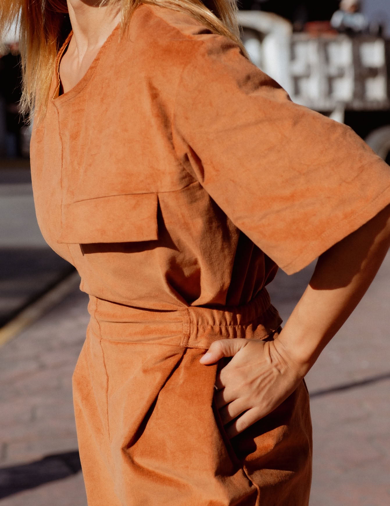 Bagan Jumpsuit in Rust (Copper) wide leg corduroy jumpsuit, side view - MAS Montréal