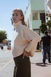 Byron Sweater in Off-White (Linen) oversized velvet rib turtleneck, side view - MAS Montréal