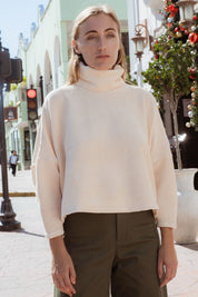 Byron Sweater in Off-White (Linen) oversized velvet rib turtleneck, back view - MAS Montréal