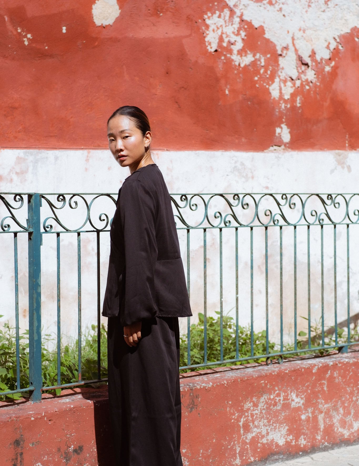 Skelling Blouse in Black (Carbon) wrap-front lyocell blouse, side view - MAS Montréal