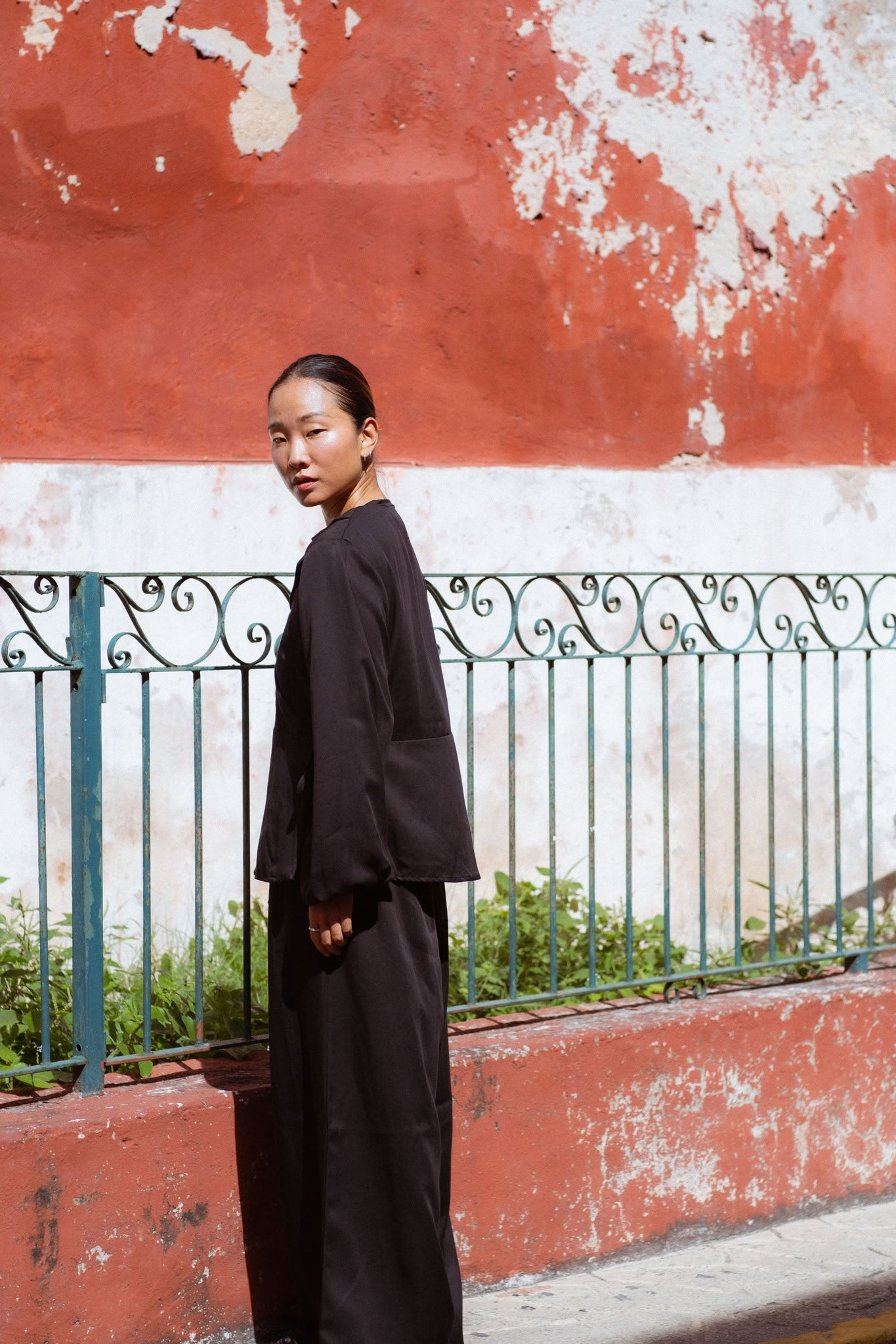 Skelling Blouse in Black (Carbon) wrap-front lyocell blouse, side view - MAS Montréal